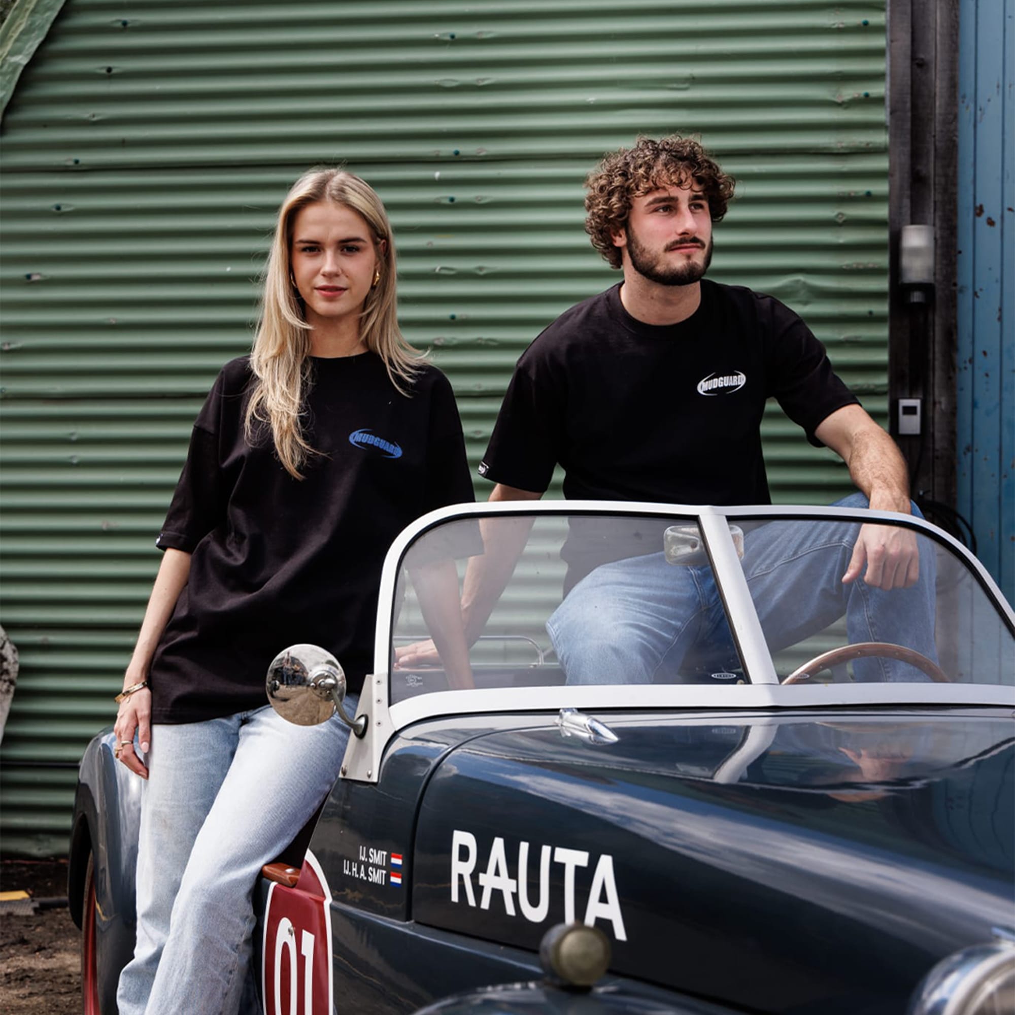 Two Mudguard models on a vintage car